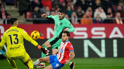 Atletico Madrid striker Alvaro Morata scores his third goal against Girona. EPA