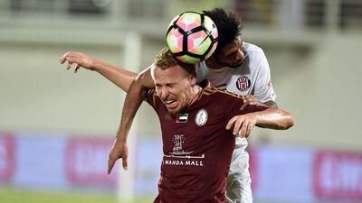 Balazs Dzsudzsak of Al Wahda leaps for the ball during the Arabian Gulf League match between Al Wahda and Al Jazira on September 13, 2016. Courtesy AGL