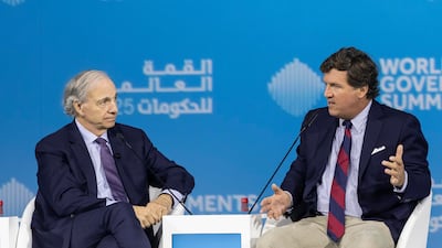Speaking at the World Governments Summit in Dubai with Tucker Carlson, Ray Dalio, left, said there is now a big global debt issue. Antonie Robertson/The National