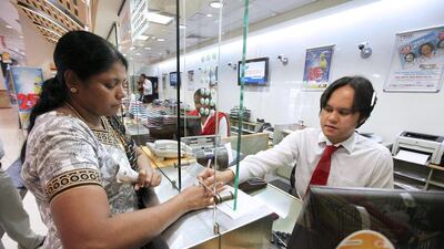 Remittances from the UAE are expected to continue at stable levels. The volumes, however, would be a little subdued as white-collar expatriates look to hold on to their reserves for better rates. Pawan Singh / The National