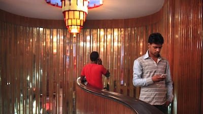 DDLJ fans wait in the lobby at Maratha Mandir. Subhash Sharma for The National