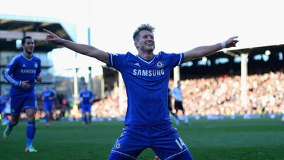 Andre Schurrle of Chelsea celebrates as he scores their third goal and completes his hat-trick against Fulham. Jamie McDonald / Getty Images