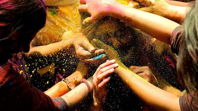 Bangalore residents smear each other in a variety of colours. Holi is celebrated at the end of the winter season on the last full moon day of the lunar month Phalguna (February or March). Jagadeesh NV / EPA