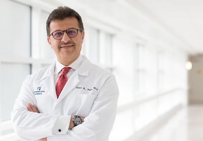 Dr Hani Najm is credited with developing a gradually self-expanding heart valve for children, which spares them the need for repeated surgery for valve replacement. Photo: Cleveland Clinic