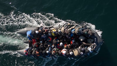 Migrants cross the English Channel. The Syrian boy arrived in the UK after doing likewise. Getty Images