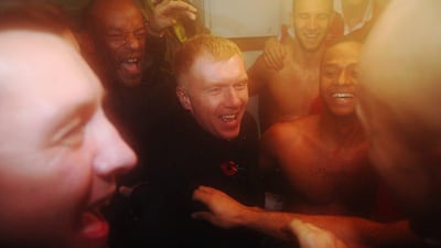 Joint Salford City owner Paul Scholes celebrates victory in the changing room after the FA Cup first round match against Notts County on Friday night. Chris Brunskill / Getty Images