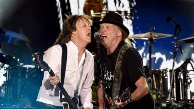 Sir Paul McCartney and Neil Young perform onstage during Desert Trip at the Empire Polo Field in Palm Springs, California. Courtesy Kevin Winter / Getty Images / AFP