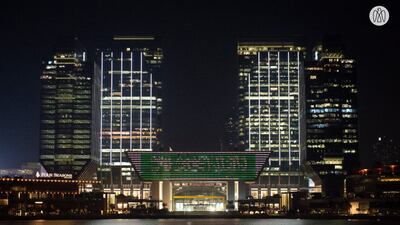 Various buildings also lit up in green for Saudi National Day. Pictured Abu Dhabi Global Market. Courtesy Abu Dhabi Government Media Office