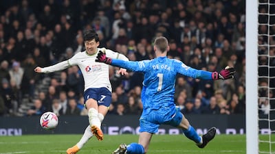 Son Heung-Min of Tottenham Hotspur scores his team's second goal past David De Gea of Manchester United at the Tottenham Hotspur Stadium on Thursday, April 27, 2023. Getty