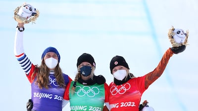 Gold medallist Lindsey Jacobellis of Team USA, centre, silver medallist Chloe Trespeuch of Team France, left, and bronze medallist Meryeta Odine of Team Canada. Getty