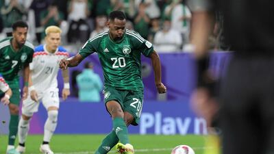 Saudi Arabia's Abdullah Radif smisses a penalty. AFP
