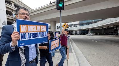 People protest against US President Donald Trump's sweeping travel ban, at Los Angeles International Airport. Reuters