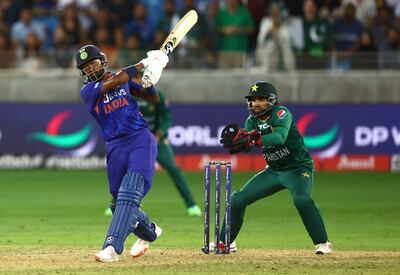 Hardik Pandya of India hits the winning runs. Getty Images