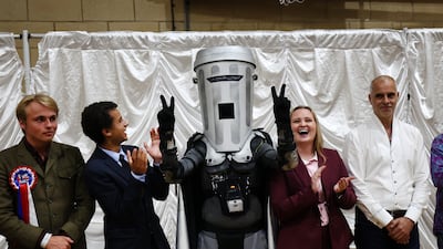 Count BinFace celebrates his second place finish with more than 9,000 votes following the Clacton by-election count. EPA