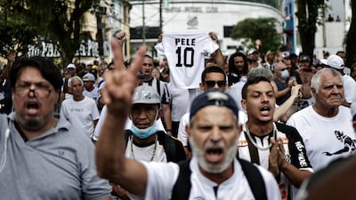 Pele fans in Santos on Tuesday. Reuters