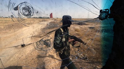 Iraqi Turkmen forces patrol a checkpoint in the northern city of Tuz Khurmatu on June 21, close to locations of the Islamic State of Iraq and the Levant. Karim Sahib / AFP Photo