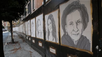 Sketches of victims of the Beirut port explosion adorn a wall near the centre of Lebanon's capital city. EPA