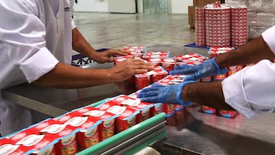Above, inside Agthia’s dairy factory in Al Ain, which produces the Yoplait yoghurt brand. Delores Johnson / The National