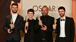 Israeli filmmakers Yuval Abraham, right, and Rachel Szor, second from left, reunite for a new documentary premiering at the Venice Film Festival. AFP
