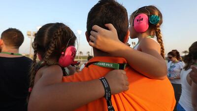 People watching the Formula 1 Etihad Airways Abu Dhabi Grand Prix from Abu Dhabi Hill at Yas Marina Circuit. Pawan Singh / The National