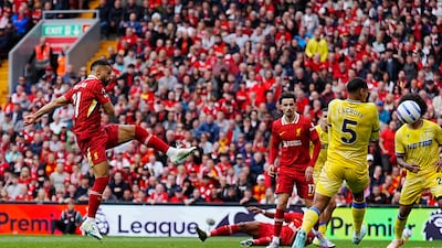 Liverpool's Mohamed Salah scores against Crystal Palace in their final game of the Premier League season at Anfield. PA