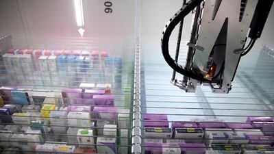 Universal Hospital in Abu Dhabi features a pharmacy dispenser robot, the first machine of its kind in the GCC. Silvia Razgova / The National
