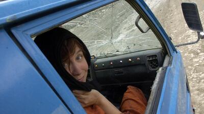 US journalist Kim Barker stranded on the Bloody mountain pass, near Khost, Afghanistan, in 2005. Courtesy Kuni Takahashi