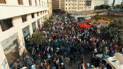 Lebanese security forces clash with supporters of the Shiite Hezbollah movement during a demonstration at Riad al-Solh square in the capital Beirut. AFP