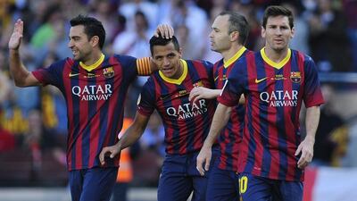 Lionel Messi, right, and Barcelona trail Atletico Madrid in La Liga by three points. Manu Fernandez / AP