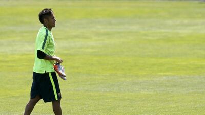 Barcelona's Neymar leaves the pitch after a training session on Tuesday ahead of Saturday's Champions League final against Juventus in Berlin. Albert Gea / Reuters / June 2, 2015