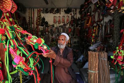 Ornaments for sacrificial animals on sale at a roadside ahead of the Muslim festival of Eid Al Adha in Peshawar, Pakistan, July 23. Bilawal Arbab/ EPA