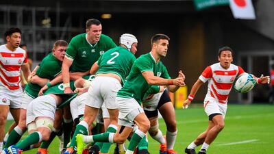 Ireland's scrum-half Conor Murray (C) plays a pass during the Japan 2019 Rugby World Cup Pool A match between Japan and Ireland at the Shizuoka Stadium Ecopa in Shizuoka. AFP