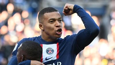 Paris Saint-Germain forward Kylian Mbappe celebrates after scoring the first goal in the 5-0 Ligue 1 victory against Auxerre at the Parc des Princes on November 13, 2022. AFP