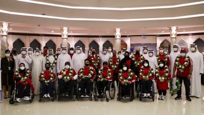 The UAE Paralympic team are welcomed by officials at Abu Dhabi International Airport.
