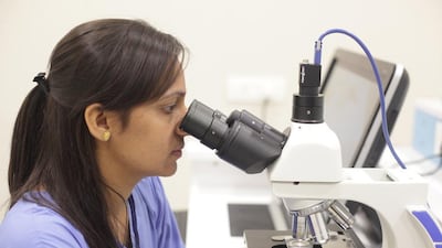 A lab technician at Dr Nayana Patel’s surrogacy hospital. Subhash Sharma for The National