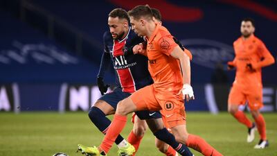 Paris Saint-Germain's Brazilian forward Neymar vies for the ball with Montpellier's French defender Arnaud Souquet. AFP