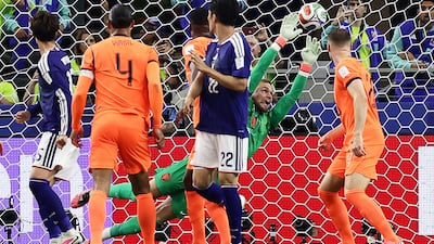 The Netherlands' goalkeeper Bart Verbruggen concedes Japan's second goal, scored by midfielder Daichi Kamada, during their Group F match at the Dallas Stadium in Arlington, which ended in a two-all draw. AFP