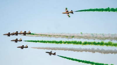 The Al Forsan aerobatic team perform a flyby during the arrival of Prince Mohamed bin Salman.
