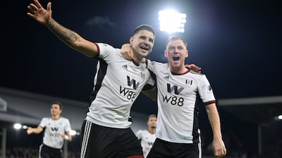 Aleksandar Mitrovic of Fulham celebrates with teammate Harrison Reed after scoring their side's second goal. Getty Images