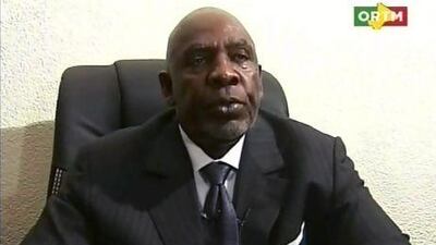 Prime minister Cheikh Modibo Diarra, dressed in a dark suit, his forehead glistening with sweat, appeared on state TV at 4am yesterday to announce his resignation, hours after soldiers stormed his house and forced him into a car.