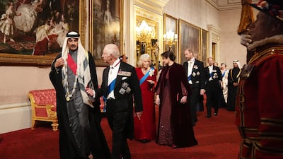 King Charles with Sheikh Tamim, followed by Queen Camilla and Sheikha Jawaher. PA