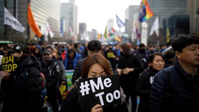 People attend a protest as a part of the #MeToo movement on the International Women's Day in Seoul, South Korea. Kim Hong-Ji / Reuters