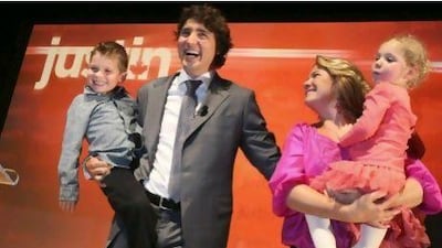 Liberal MP Justin Trudeau and his wife, Sophie Gregoire, with children Xavier and Ella-Grace announce his run for the Liberal party leadership in Montreal.
