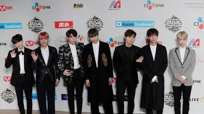 The agency for the South Korean band BTS has apologized for a member wearing a T-shirt depicting the explosion of an atomic bomb. Kin Cheung / AP photo