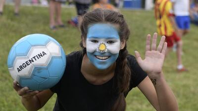 A girl with a painted face poses as she attends a party organised by the village of Bronnitsy. AFP