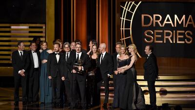 Show creator Vince Gilligan, centre, with cast and crew accept Outstanding Drama Series for Breaking Bad onstage at the 66th Annual Primetime Emmy Awards held at Nokia Theatre LA Live on August 25, 2014 in Los Angeles, California. Kevin Winter / Getty Images / AFP