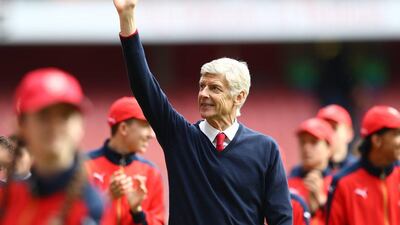 Arsene Wenger waves to Arsenal supporters after their match with Aston Villa at Emirates Stadium on May 15, 2016. (Julian Finney/Getty Images)