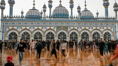 Worshippers leave Jamia Mosque in Rawalpindi, central-eastern Pakistan, after offering the first Friday prayers of the holy month. AFP
