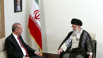 Iran's Ayatollah Ali Khamenei, right, with Turkey's Recep Tayyip Erdogan are pursuing deeply ideological projects in the Middle East. AP Photo