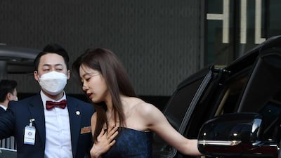 Singer Hahm Eun-jung arrives on the red carpet of the 56th annual Daejong Film Awards. AFP